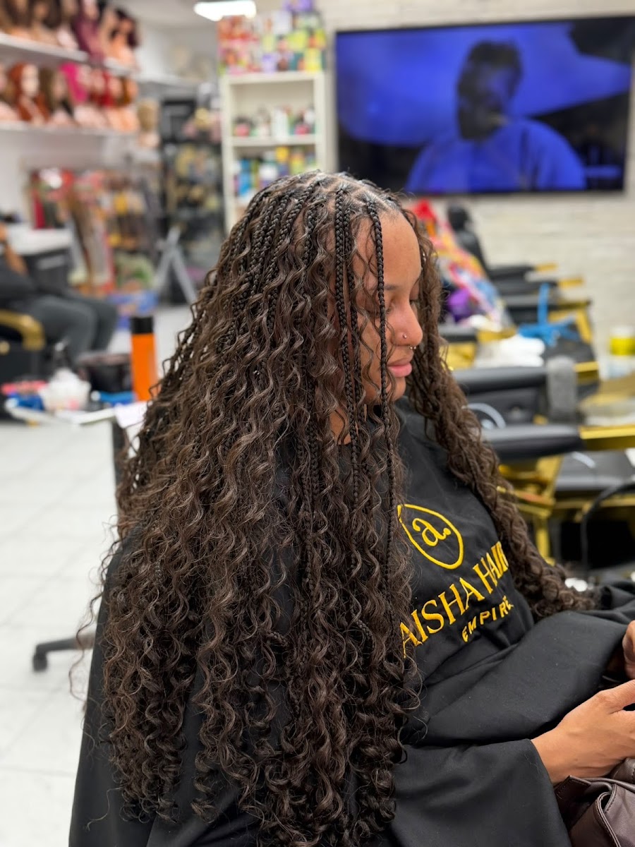 Aisha Hair Empire, beauty salon at 1170 Albion Road in Etobicoke, Toronto