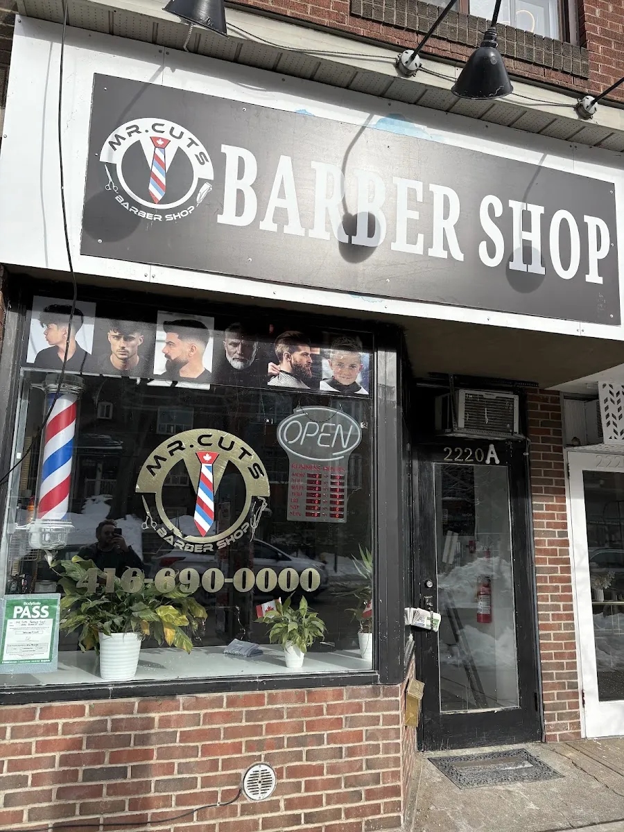 Mr. Cuts Barber Shop, hair salon at 2220 Queen Street East in Old Toronto, Toronto